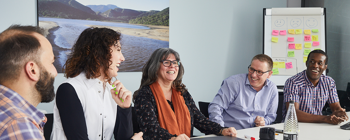 The Merapar team at work in the office