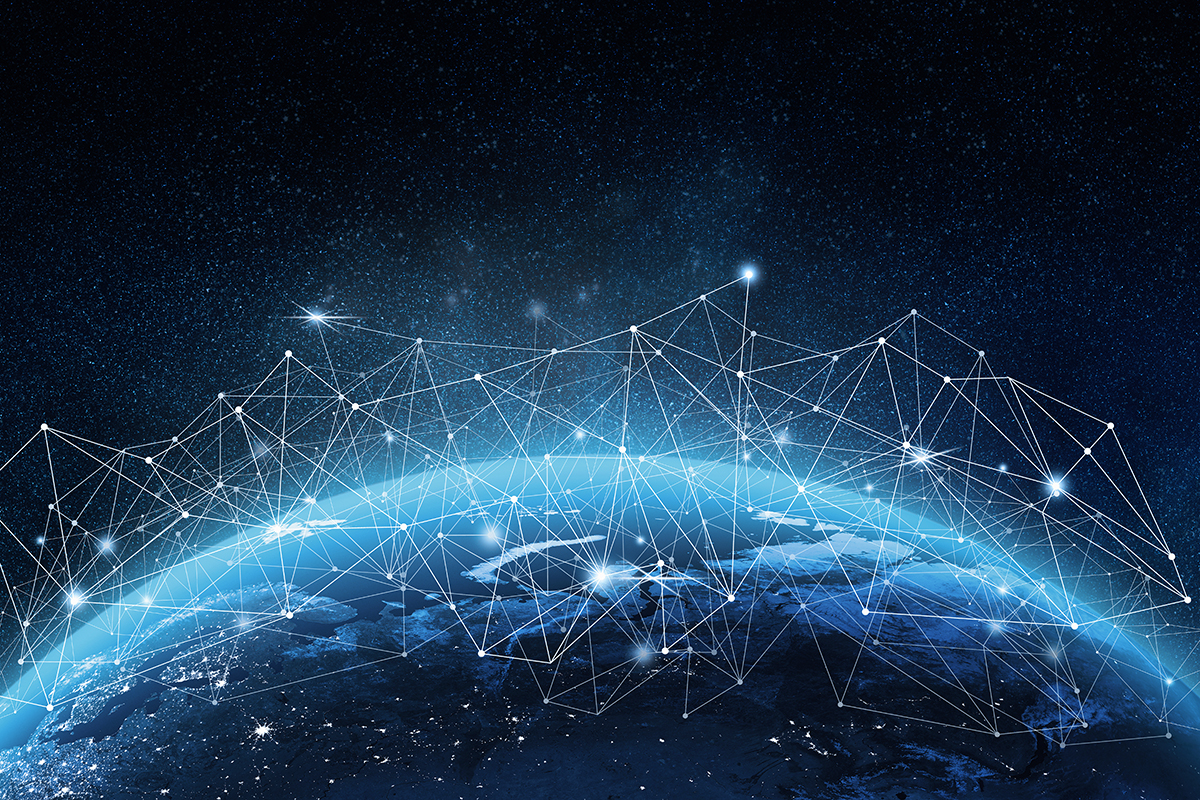 The globe at night, overlaid with a network of connections